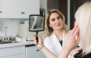 Dr. Maia with a patient in the medical office