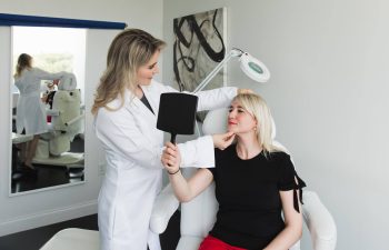 Dr. Maia with a patient in the medical office