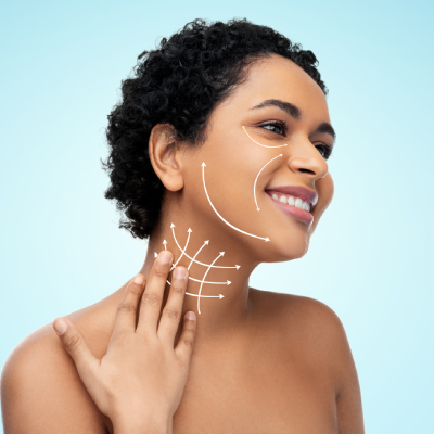 happy smiling young african american woman with arrows on face and neck