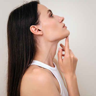 woman touching her chin