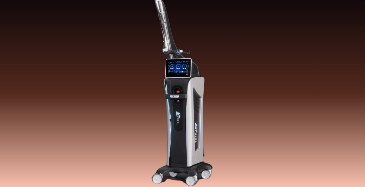 Medical laser device with a digital display and control panel, mounted on wheels, set against a gradient brown background.